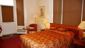 A bed or beds in a room at Studio-47 