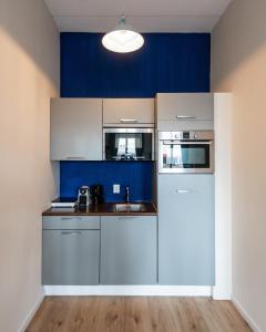 Η κουζίνα ή μικρή κουζίνα στο Aparthotel North Spacious Studio for two +16 φωτογραφίες