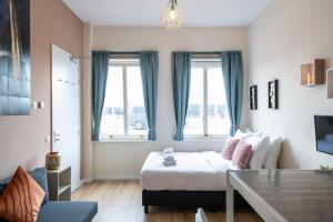 Ένα ή περισσότερα κρεβάτια σε δωμάτιο στο Aparthotel North Spacious Studio for two