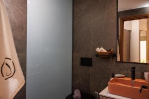 Koupelna v ubytování Jolly Suites