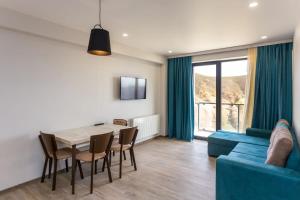 Posezení v ubytování 1BR Apartment in Twins Gudauri project