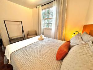 Postel nebo postele na pokoji v ubytování Apartamento reformado e moderno no Serraville + 55 fotografií