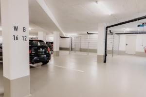 a garage with a car parked in it at Heufeldboardinghouse in Kelheim