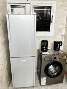 Kuchyň nebo kuchyňský kout v ubytování Apartment Pool- Balcony- Parking- Self CheckIn- WIFI -A3
