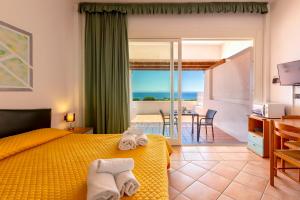 A bed or beds in a room at Residence Le Vele