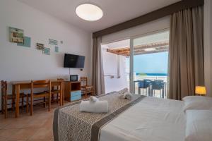 A bed or beds in a room at Residence Le Vele