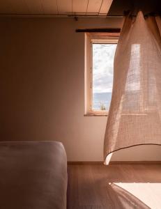 A bed or beds in a room at Mastrojanni Relais