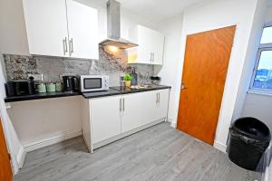 Η κουζίνα ή μικρή κουζίνα στο Modern Studio Apartment - Near Luton Station