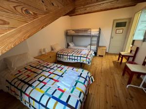 Postel nebo postele na pokoji v ubytování Residencial Avenida Hostel