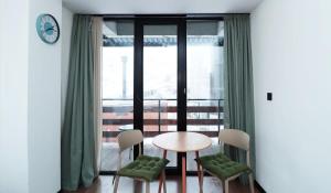 Posezení v ubytování Cozy Studio Apartment in Marshall Gudauri Project