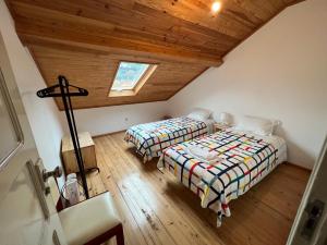Postel nebo postele na pokoji v ubytování Residencial Avenida Hostel