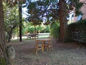 Zahrada ubytování MARIA HOLIDAY HOMES La Pineta di Sinalunga