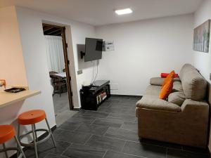 TV a/nebo společenská místnost v ubytování Sonora Aircon Bungalow 121