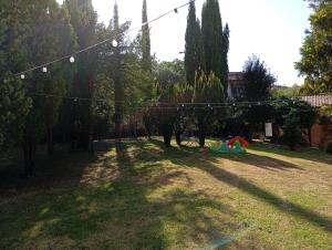 Zahrada ubytování MARIA HOLIDAY HOMES La Pineta di Sinalunga