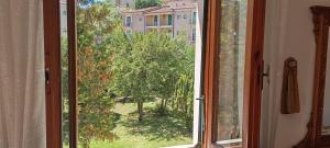 Zahrada ubytování MARIA HOLIDAY HOMES La Pineta di Sinalunga