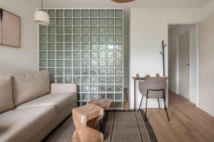 Posezení v ubytování L'Hotel de JC - CHU