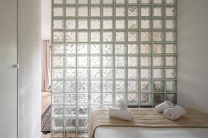 Postel nebo postele na pokoji v ubytování L'Hotel de JC - CHU + 31 fotografií