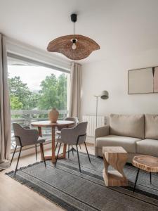 Posezení v ubytování L'Hotel de JC - CHU