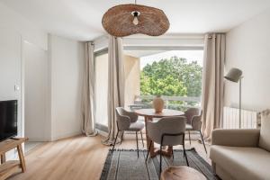 Posezení v ubytování L'Hotel de JC - CHU