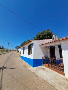 a house on the side of a road at Sweet Living Alentejo in Brinches