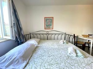 Postel nebo postele na pokoji v ubytování Apartments G&G