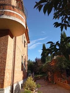 Zahrada ubytování MARIA HOLIDAY HOMES La Pineta di Sinalunga