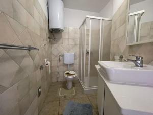 Koupelna v ubytování Apartments G&G