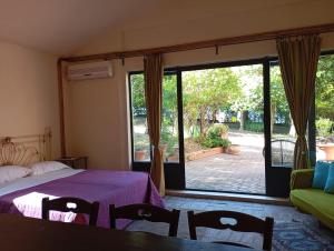 Postel nebo postele na pokoji v ubytování MARIA HOLIDAY HOMES La Pineta di Sinalunga