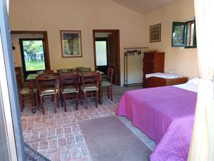 Postel nebo postele na pokoji v ubytování MARIA HOLIDAY HOMES La Pineta di Sinalunga