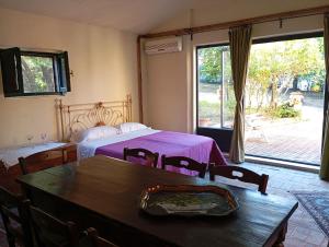 Postel nebo postele na pokoji v ubytování MARIA HOLIDAY HOMES La Pineta di Sinalunga