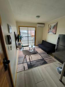 Posezení v ubytování APART HOTEL EN BULNES