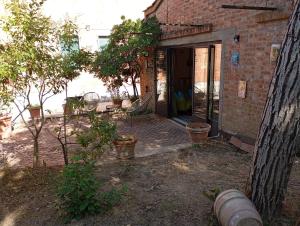 Zahrada ubytování MARIA HOLIDAY HOMES La Pineta di Sinalunga