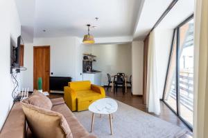 Posezení v ubytování Stylish 1BR Apartment In Marshall Project + 6 fotografií