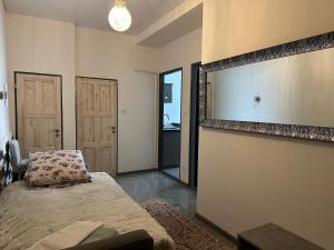 Posteľ alebo postele v izbe v ubytovaní APARTMEN PRAHA