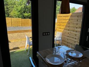 Fotografie z fotogalerie ubytování Tiny house avec jardin clos et privatif proche Disneyland et parc des félins v destinaci Saint-Augustin
