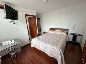 Hotel Santris客房内的一张或多张床位