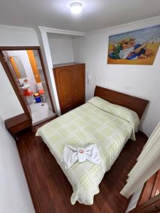 Hotel Santris客房内的一张或多张床位