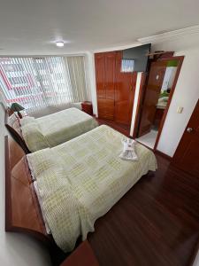 Hotel Santris客房内的一张或多张床位