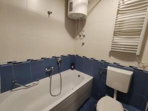 Koupelna v ubytování Apartment EMMI