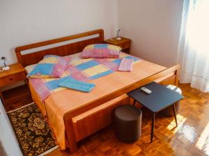 Postel nebo postele na pokoji v ubytování Apartmani Babaja