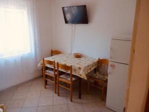 Kuchyň nebo kuchyňský kout v ubytování Apartmani Babaja