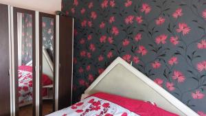 Ένα ή περισσότερα κρεβάτια σε δωμάτιο στο Tulcea E3