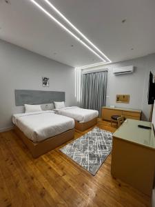 Postel nebo postele na pokoji v ubytování Zamalek House Hotel