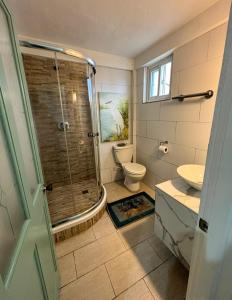 Vannituba majutusasutuses Petti Fleur Apartment