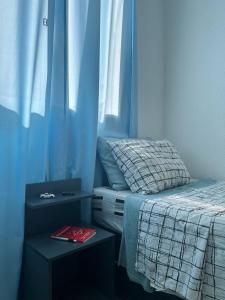 Postel nebo postele na pokoji v ubytování Apartamento 2 Quartos Aconchegante a 21 Km e 30min do Aeroporto de Confins