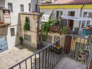 an image of a balcony of a building at Dimora dei Mercanti Suites in Turin