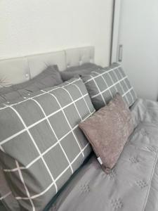 Postel nebo postele na pokoji v ubytování Apartamento 2 Quartos Aconchegante a 21 Km e 30min do Aeroporto de Confins