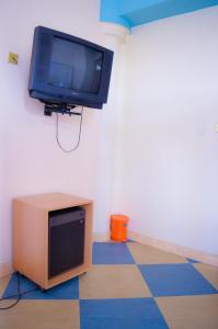 TV a/nebo společenská místnost v ubytování Stardom Hotel + 19 fotografií