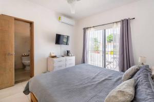 TV a/nebo společenská místnost v ubytování Carlota Guest House