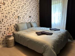 Postel nebo postele na pokoji v ubytování Backens Gästhem